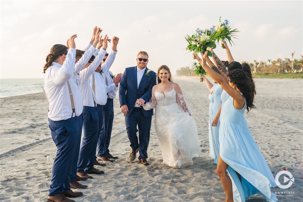 Florida beach wedding party photos by Complete Weddings + Events Fort Myers.