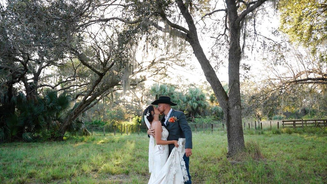 The Venue at Mudge Ranch Wedding Couple Kissing